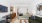 studio bedroom layout with bed and seating area 