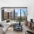 Large well lit living room with oversized windows