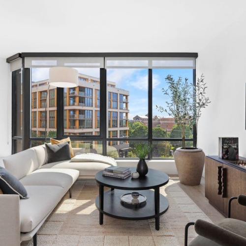 Open Living Concept  Large well lit living room with oversized windows