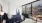 Well lit bedroom with oversized window