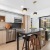 Spacious kitchen with island, and  large oversized windows