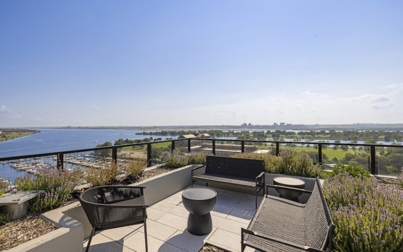 Shared Amenity Access Rooftop outdoor seating with river views