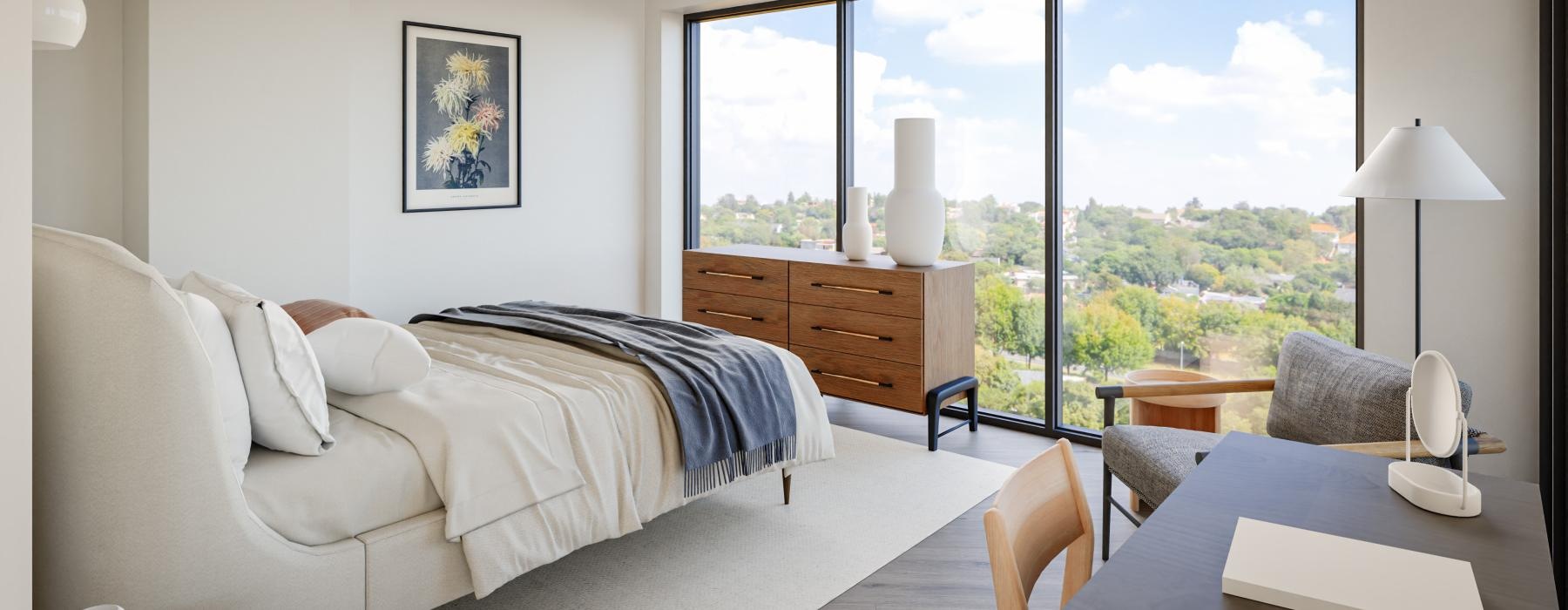 a bedroom with a large window